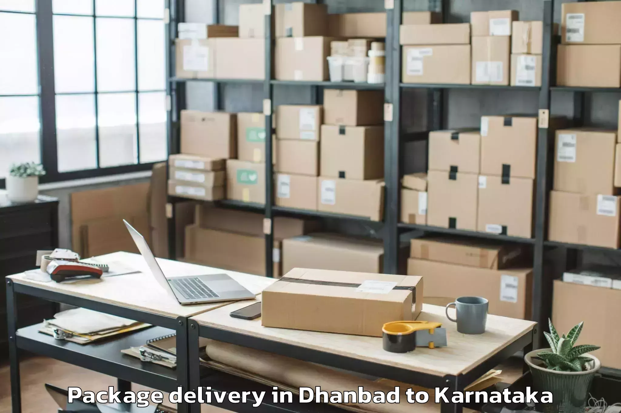 Quality Dhanbad to Muddebihal Package Delivery